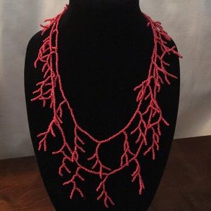 Coral beaded loop necklace